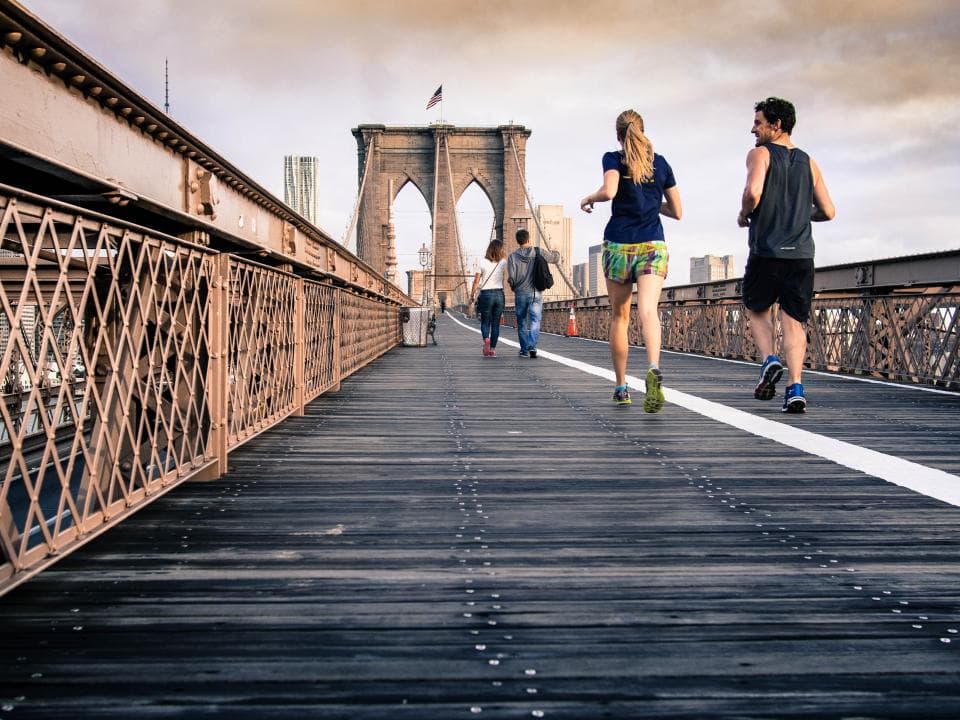 Runners crossing the Brooklyn Bridge